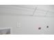 Bright laundry area featuring white wire shelving, convenient outlets, and washer/dryer hookups at 204 West Bradford Pointe Dr, Summerville, SC 29486
