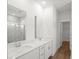 Bathroom with double sink vanity, quartz countertop, and glass shower at 319 Calm Water Way, Summerville, SC 29486