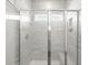 Bathroom with glass shower and tile surround with bench seating at 319 Calm Water Way, Summerville, SC 29486