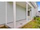 Covered patio offers space for outdoor seating, enhancing the home's appeal with additional light at 323 Trailmore Ln, Summerville, SC 29486