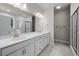 Bright bathroom featuring dual sinks, a shower and a bath tub at 244 Mcmakin Dr, Summerville, SC 29483