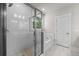 Bright bathroom featuring a glass shower and a separate bath tub at 244 Mcmakin Dr, Summerville, SC 29483