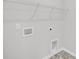 White laundry room with shelving and new tile at 317 Abercom Place Dr, Moncks Corner, SC 29461