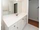 Bathroom featuring a white vanity with a mirror and an open door in the background at 1441 Waterside Ct, Mount Pleasant, SC 29464