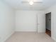 Simple bedroom with carpet, a ceiling fan, and a white door leading to another room at 1441 Waterside Ct, Mount Pleasant, SC 29464