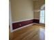 Bright dining room with hardwood floors and a large window at 1441 Waterside Ct, Mount Pleasant, SC 29464