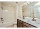 Bathroom with double vanity, tub and neutral tile flooring at 104 Elliott Creek Ln, Summerville, SC 29485