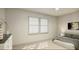 Serene bedroom with a dresser and large window at 104 Elliott Creek Ln, Summerville, SC 29485