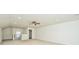 Spacious bonus room with neutral carpeting and ceiling fan at 104 Elliott Creek Ln, Summerville, SC 29485
