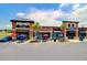 Modern commercial building with brick facade, multiple storefronts, and ample parking at 373 Whispering Breeze Ln, Summerville, SC 29486