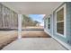 Covered porch with view of expansive backyard and neighboring home at 336 Hillman Trail Dr, Moncks Corner, SC 29461