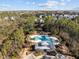 Aerial view of community pool, clubhouse, and surrounding homes at 3510 Saltflat Ln, Mount Pleasant, SC 29466