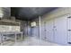 Unfinished basement with AC unit and storage at 26 Twin Oaks Ln, Isle of Palms, SC 29451