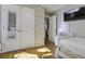 Bedroom with twin bed, hardwood floors and access to another bedroom at 26 Twin Oaks Ln, Isle of Palms, SC 29451