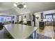 Open concept dining area with a large table and kitchen views at 26 Twin Oaks Ln, Isle of Palms, SC 29451