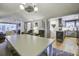 Open concept dining area with a large table and kitchen views at 26 Twin Oaks Ln, Isle of Palms, SC 29451