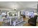 Bright dining area with farmhouse table and bench seating at 26 Twin Oaks Ln, Isle of Palms, SC 29451
