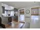 Modern kitchen with gray cabinets, stainless steel appliances, and granite countertops at 26 Twin Oaks Ln, Isle of Palms, SC 29451