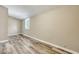 Inviting bedroom featuring modern flooring, a window, and neutral walls, offering a serene and relaxing space at 2754 Houston St, North Charleston, SC 29405