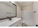 Classic bathroom showcasing a vanity with undermount sink, framed mirror, and shower/tub combination at 144 Seaton Street, Summerville, SC 29486