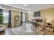 Spacious bedroom features tray ceiling, neutral decor, large windows, and plush carpet at 144 Seaton Street, Summerville, SC 29486