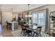 Charming dining area with modern furnishings, perfect for Gathering meals and entertaining guests with style at 144 Seaton Street, Summerville, SC 29486