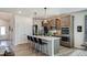 Stylish kitchen with stainless appliances, island with seating, and ample cabinet space, perfect for cooking at 144 Seaton Street, Summerville, SC 29486