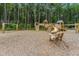 Well-maintained playground with slides, climbing areas, bench seating and mature trees at 144 Seaton Street, Summerville, SC 29486