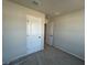 A sunny bedroom with a view into another room and two ceiling vents at 5138 Double Eagle Loop, Summerville, SC 29485