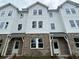 Beautiful townhome exteriors with brick accents and inviting entrances at 5142 Double Eagle Lp, Summerville, SC 29485