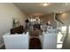 Open-concept living room with view into kitchen and dining area at 5142 Double Eagle Lp, Summerville, SC 29485