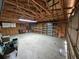 Bright and airy garage with plenty of room for storage, shelving, and a workbench at 7024 E Constellation Dr, North Charleston, SC 29418