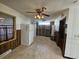 View of a bright, functional kitchen with a refrigerator, ceiling fan, and additional shelving at 7024 E Constellation Dr, North Charleston, SC 29418