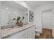 Bright bathroom with double vanity, granite countertops, and a glass-enclosed shower at 764 Meadowbrook Ln, Summerville, SC 29486
