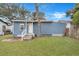 Lovely backyard with a lush green lawn, offering a serene outdoor space for relaxation and enjoyment at 2265 Bailey Dr, North Charleston, SC 29405