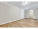 Clean basement space featuring light wood flooring and neutral paint, perfect for customization at 2265 Bailey Dr, North Charleston, SC 29405