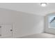 Bright bedroom with a window, carpet, and a storage closet at 318 Abercom Place Dr, Moncks Corner, SC 29461