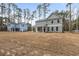 Home with a spacious backyard, mature trees, and a detached garage at 5876 Hwy 165, Ravenel, SC 29470