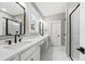 Bathroom boasts double sink vanity with modern fixtures and a glass enclosed shower at 5876 Hwy 165, Ravenel, SC 29470