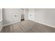 Bright bedroom features neutral carpet, white trim, and closet at 5876 Hwy 165, Ravenel, SC 29470
