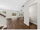 Spacious living area with sliding doors to the outside and staircase to the next level at 5876 Hwy 165, Ravenel, SC 29470