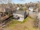 Back exterior of the home with screened porch, patio, large yard and fence at 102 Teakwood Ct, Summerville, SC 29485