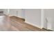Light brown wood flooring in basement hallway at 1112 Moss Grove Dr, Moncks Corner, SC 29461