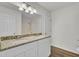Double vanity bathroom with granite countertop and white cabinets at 1112 Moss Grove Dr, Moncks Corner, SC 29461