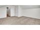 Spacious bedroom with carpet, double doors, and an adjoining bathroom at 1112 Moss Grove Dr, Moncks Corner, SC 29461