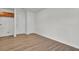 Spacious hallway with wood-look flooring and access to other rooms at 1112 Moss Grove Dr, Moncks Corner, SC 29461
