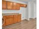 Modern kitchen with wood cabinets and granite countertops at 1112 Moss Grove Dr, Moncks Corner, SC 29461