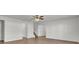 Living room with vinyl flooring and staircase access at 1112 Moss Grove Dr, Moncks Corner, SC 29461