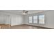 Living room with vinyl flooring and multiple windows at 1112 Moss Grove Dr, Moncks Corner, SC 29461