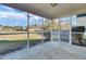 Cozy screened porch overlooking backyard and neighborhood at 1112 Moss Grove Dr, Moncks Corner, SC 29461